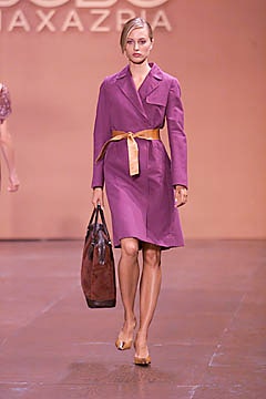 purple belted coat with brown bag