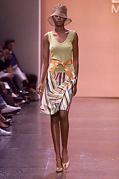 green fitted top with multi skirt