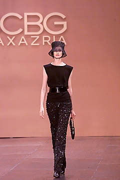 black fitted top with sequined pants