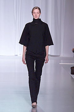 black relaxed top and slim pants