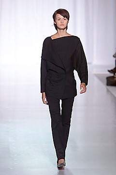 black fitted top and slim pants