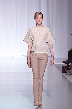 beige embroidered top with tan pants