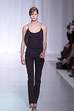 black silk top with fitted pants