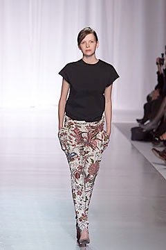 black fitted top with floral pants