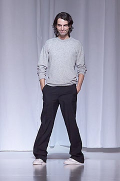 gray wool sweater and black pants