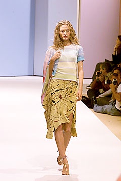 beige asymmetric silk midi dress and blue color-blocked top