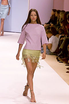 pink relaxed top with green mini skirt