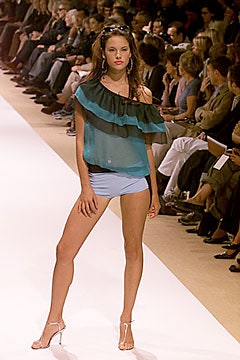 black teal sheer off-shoulder top with blue shorts