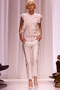 white silk sleeveless v-neck fitted ruffled blouse