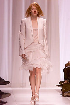 white tulle sleeveless v-neck fitted tiered flowing dress