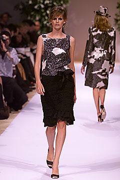 black and white fitted top with pleated skirt