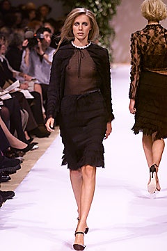 black ruffled midi skirt with sheer blouse