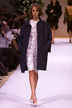 white lace midi dress with black coat