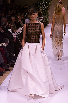 black silk sleeveless top and white midi skirt