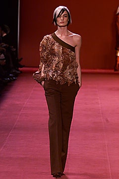brown asymmetric top and tailored pants