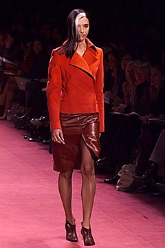 red leather fitted jacket and brown pencil skirt