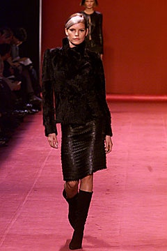 black fur jacket and leather skirt