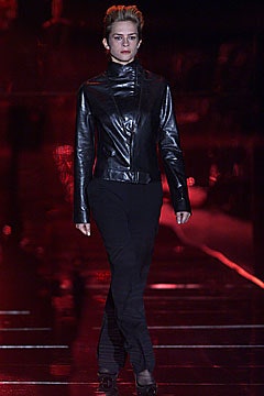 black leather fitted jacket and slim pants