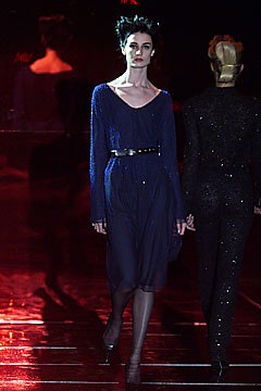 blue relaxed midi dress and black sequined catsuit