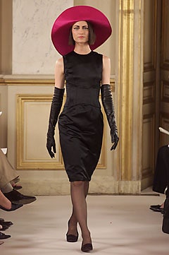 black silk fitted dress with pink hat