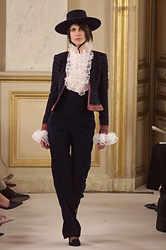 black fitted jacket white ruffled blouse