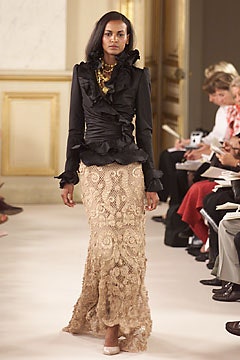 black silk ruffled blouse and beige lace skirt
