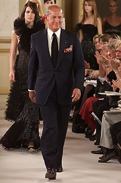 black ruffled dress and navy suit