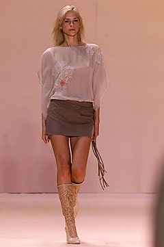 white silk relaxed top with brown skirt