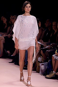 white silk sleeveless mini dress