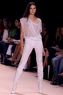 white embellished top with fitted pants