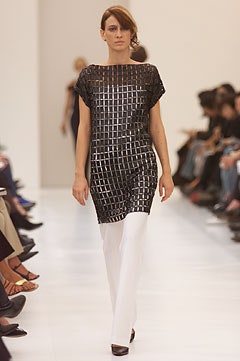 black silk sheer top with white pants