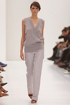 gray sleeveless top with white checked pants