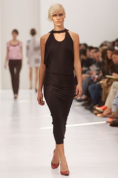 black silk fitted dress with red shoes