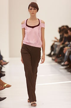 pink off-shoulder top with brown pants