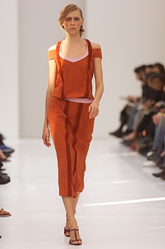 fitted orange silk top and skirt