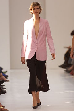 pink tailored blazer with black skirt