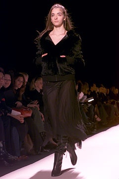 black faux-fur coat and dress