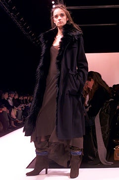 black faux-fur coat and brown silk dress