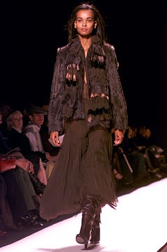 black fur coat and silk skirt