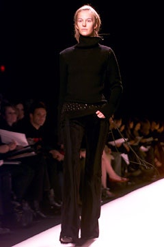 black fitted wool top and pants