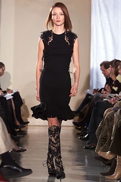 black fitted mini dress with lace boots