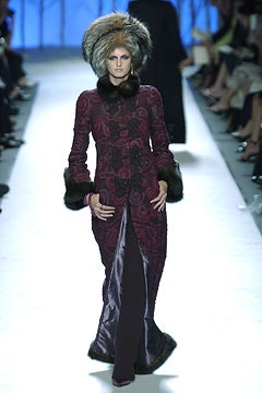 purple embroidered gown with fur hat