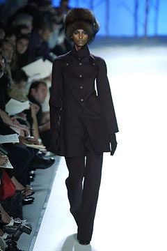 purple wool coat and tailored pants