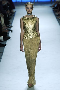 gold pleated sleeveless gown