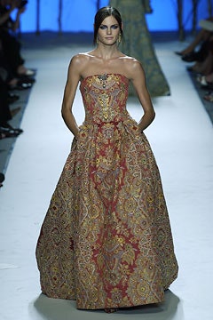 red and gold strapless gown