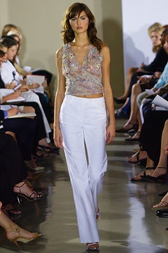 multi-colored silk sleeveless top and white tailored pants