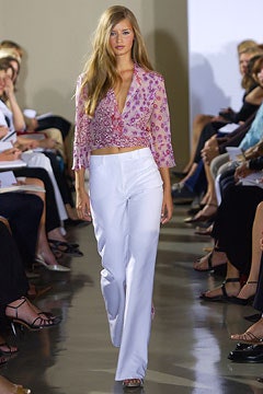 pink embroidered cropped top and white tailored pants