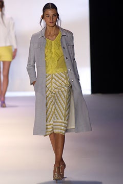 gray coat with yellow top