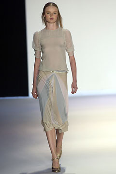 beige silk fitted top and midi skirt