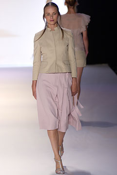 beige jacket and pink skirt